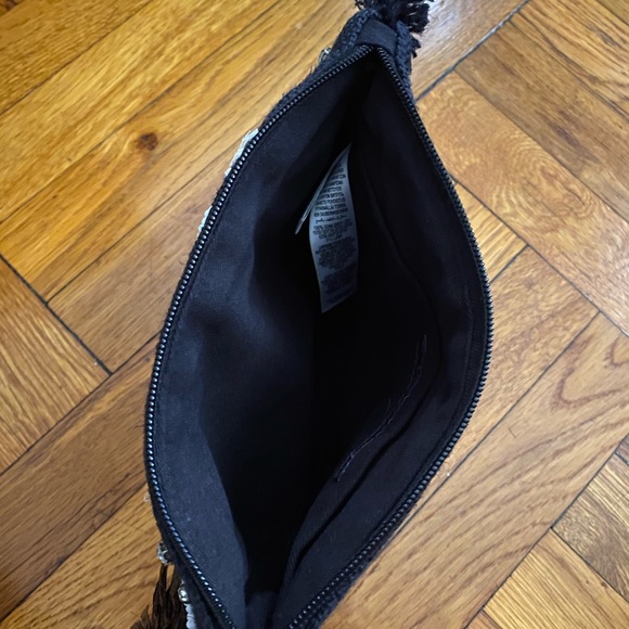 M&S black clutch with off white flowers. - Picture 3 of 4